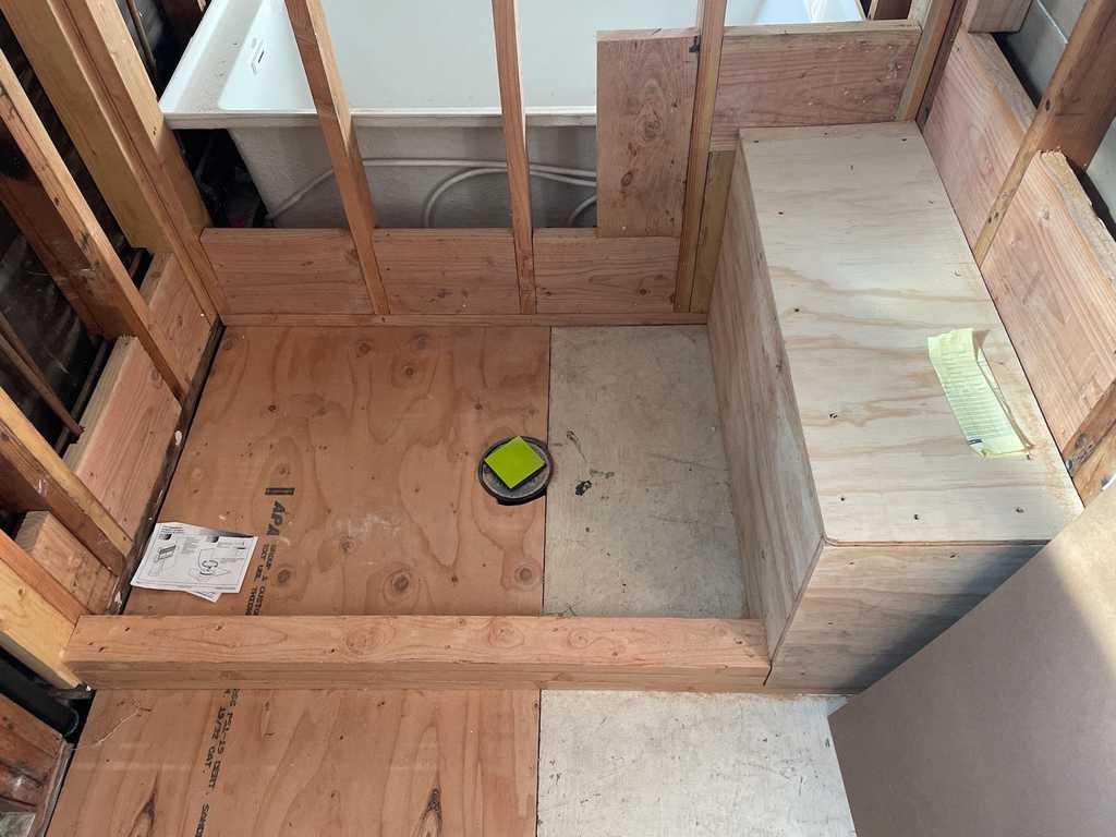 a2mContractors carpentry work for for a walk in shower, now ready for hot mob