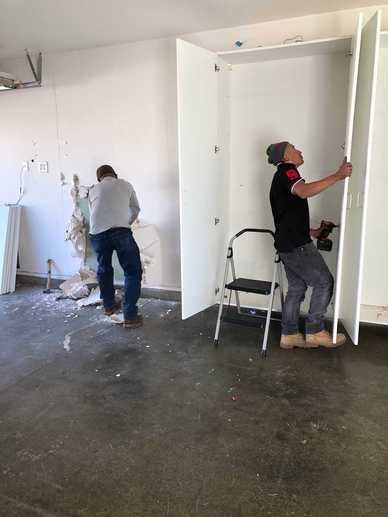 garage conversion removing the old storage cabinets
