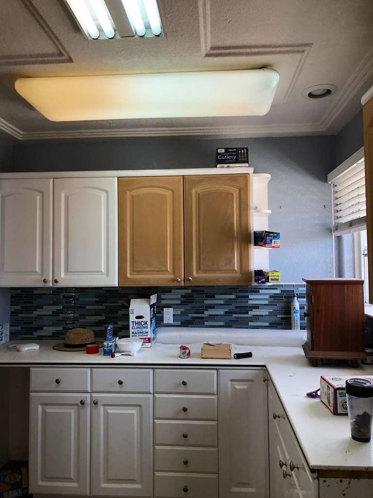 1st-floor-remodel-showing-old-kitchen-cabinets-and-countertops