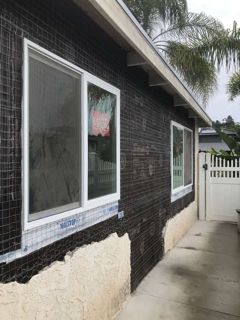 2nd-floor-addition-showing-lath-paper-wall-and-new-vinyl-window