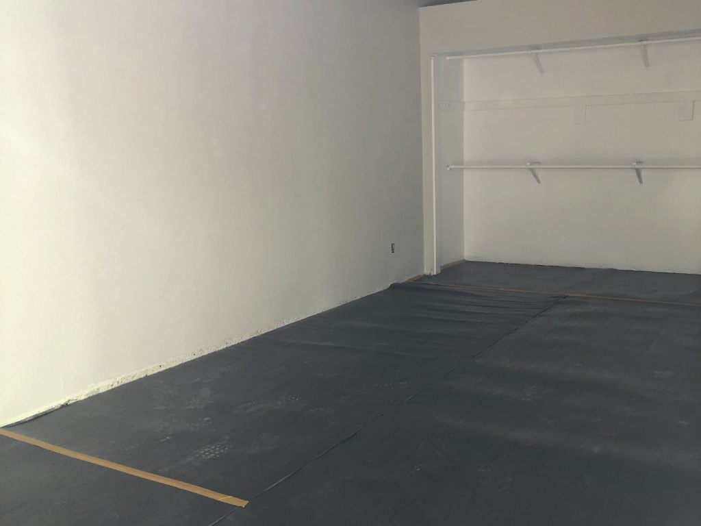 Attached Vapor Barrier Underlayment in the Bedroom, a2mContractors