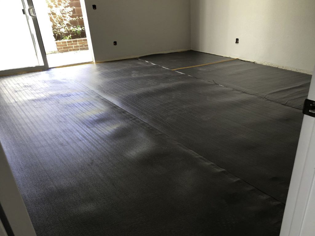 Attached Vapor Barrier Underlayment, a2mContractors