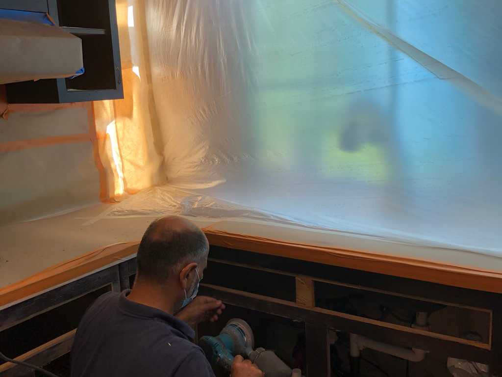 sanding cabinet surfaces,  a2mContractors