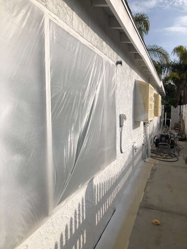 protecting window frames with visqueen