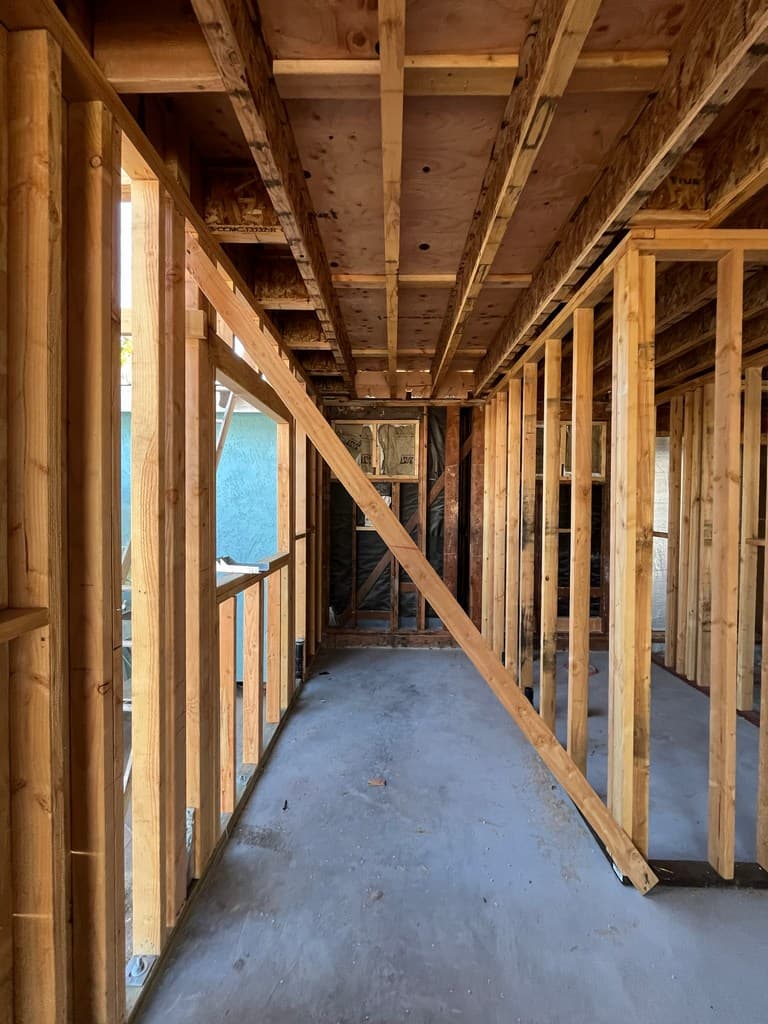 Interior guest house hallway framing and ceiling joists.