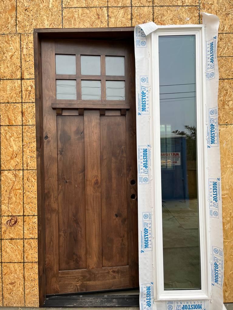 Window framing progress inside residential renovation project.