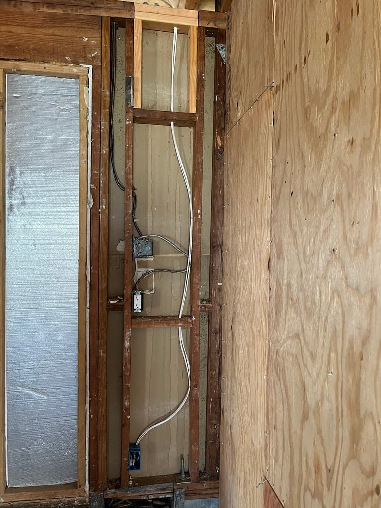 Guest quarters wall with electrical rough-in.