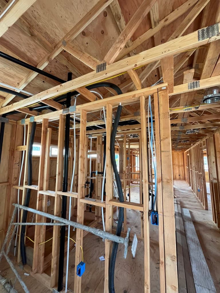 ADU wall framing with utility rough-in.