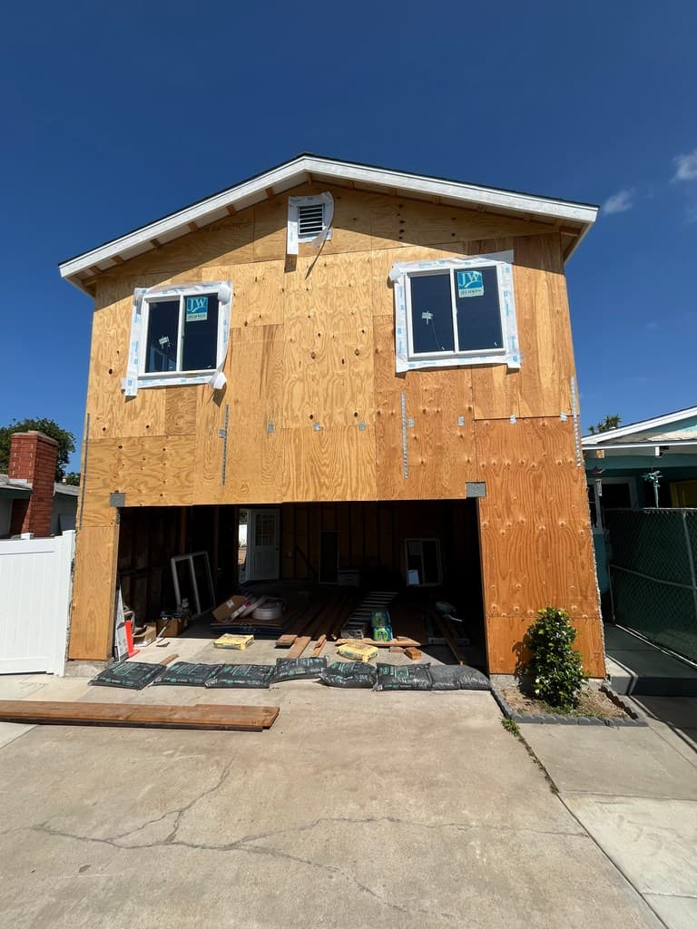 Garage ADU exterior with new vinyl windows.