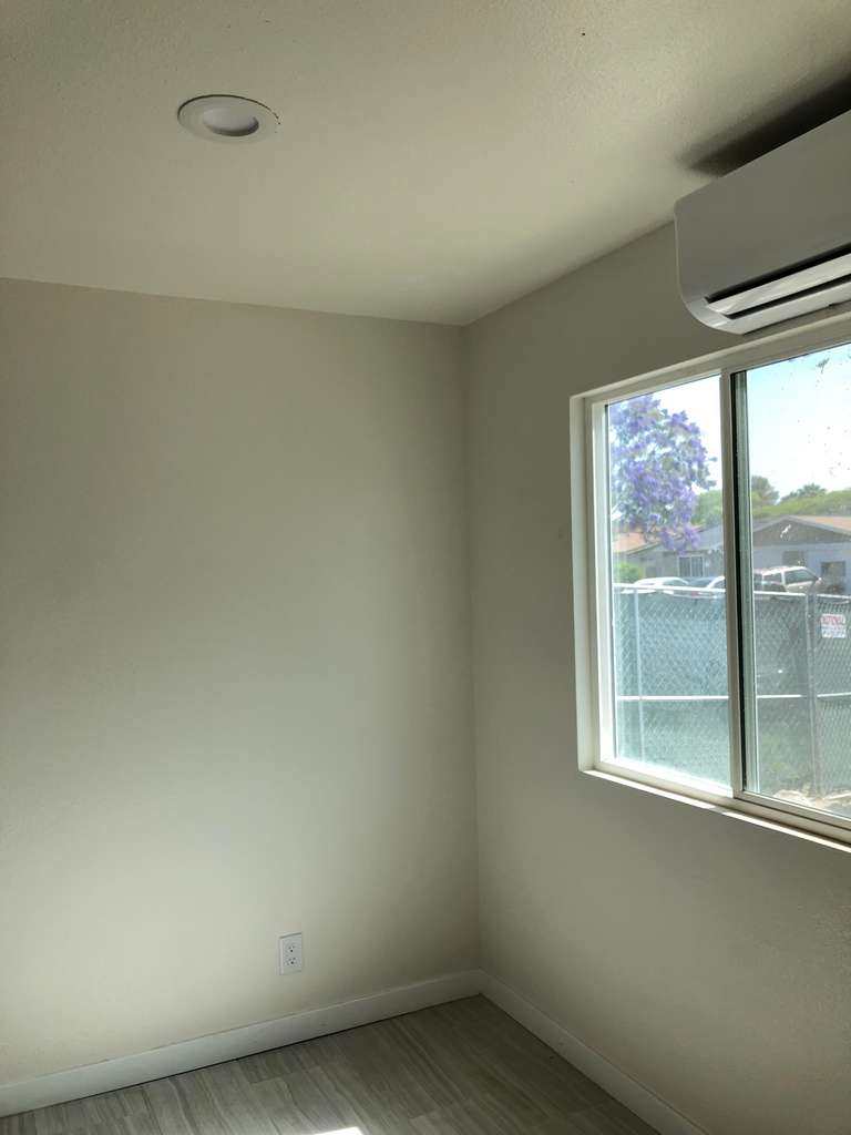 new-bedroom-showing-Mini-Split-HVAC-and-vinyle-window 