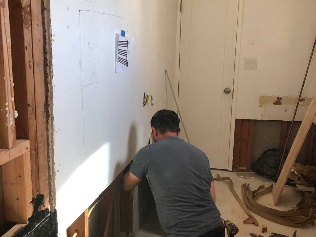 securing drywall to the studs walls in a bathroom remodel