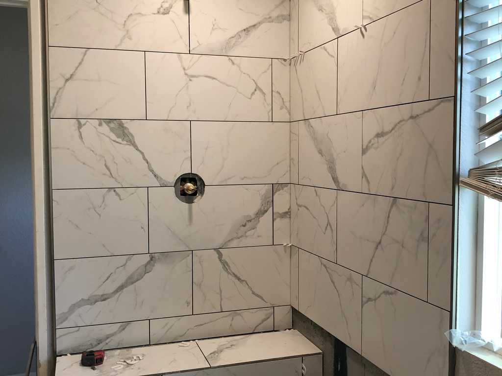 bathroom remodel showing spacers between tiles