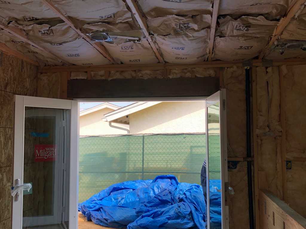 ADU showing fiberglass installation between ceiling joists