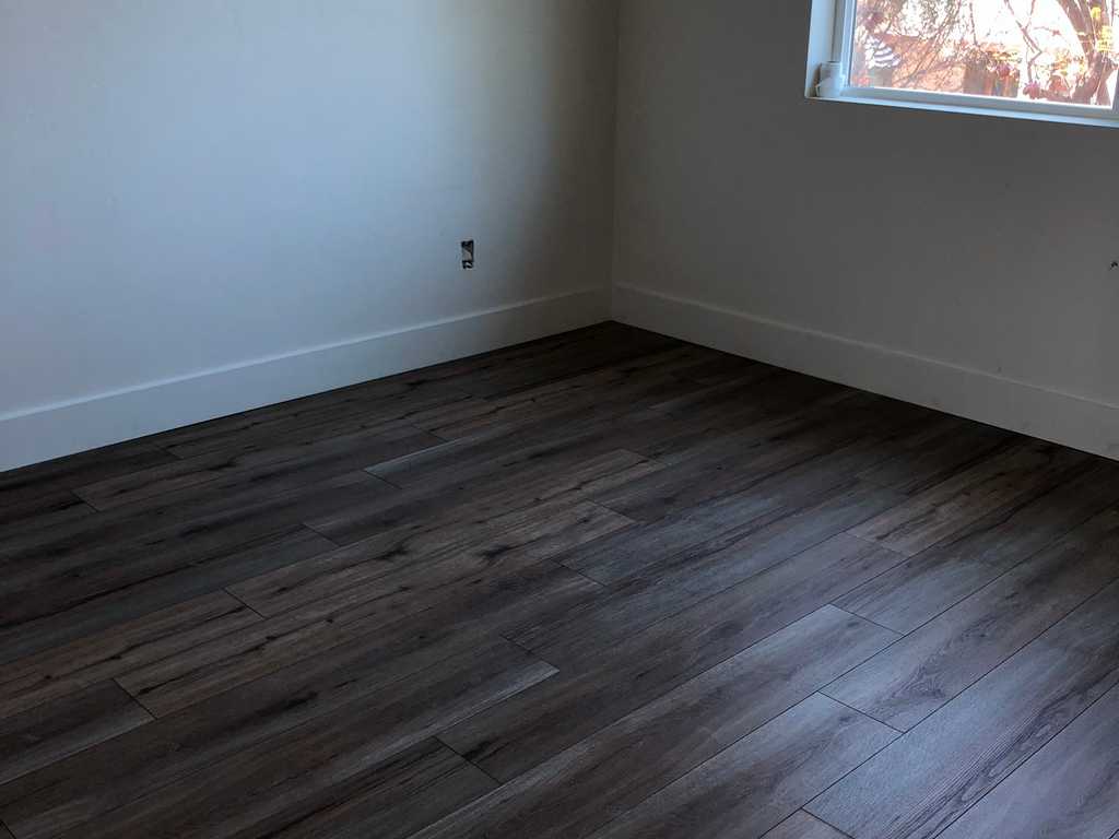 ADU showing new wood floor in the bedroom