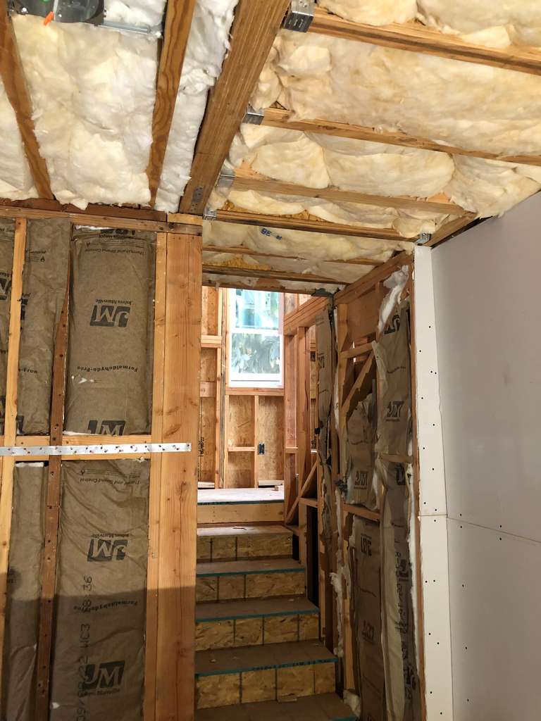 rolled-and-batted-fiberglass-insulation-in-the-framed-studs,-joists,-and-beams