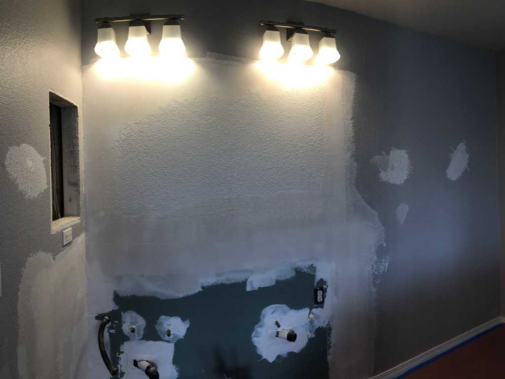 bathroom-remodel-A2M-Contractors-texturing the walls
