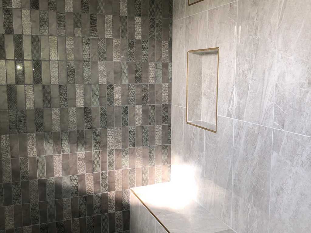 walk-in shower finshed walls with custom bench
