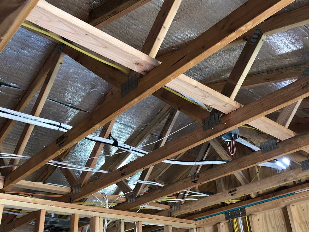 ADU showing electrical pvc conduits in the gable roof truss