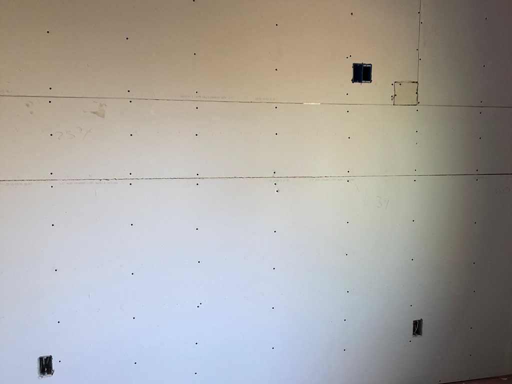 ADU internal wall with exposed joints and electrical box cut outs