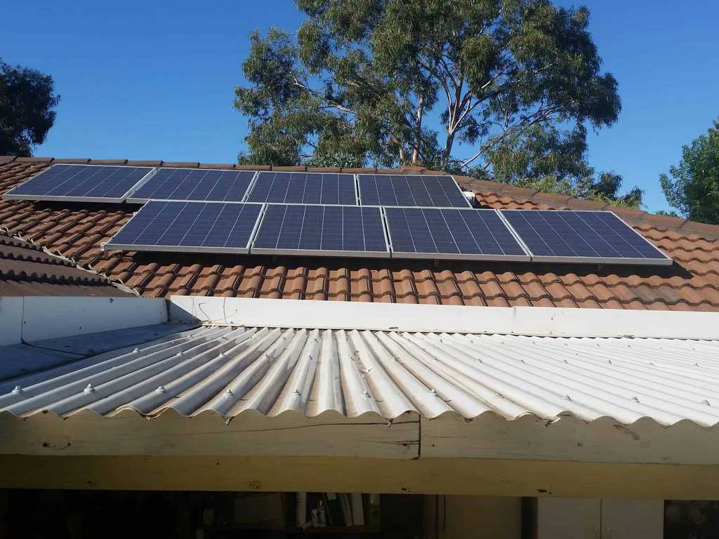 a2m contractors solar panels on clay tile roof