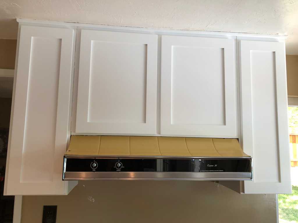 a2mContractors%20painted%20storage%20boxes%20surrounding%20kitchen%20Hood,%2023.JPG